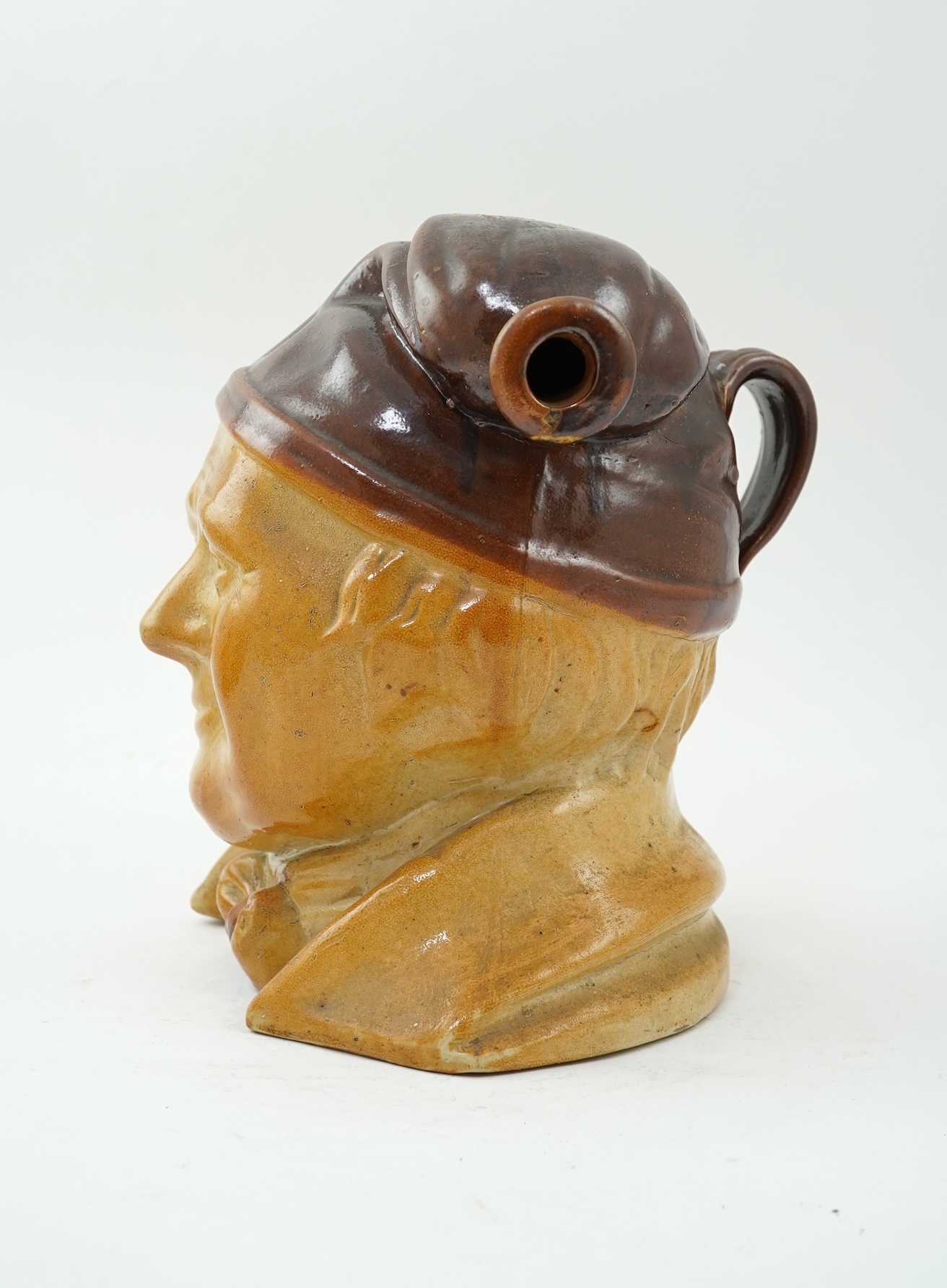 A large 19th century Johnny Souter, salt glazed stoneware spirit flask impressed T A Moss wine and spirit Merchant Bell Mount street Grosvenor square, 28cm high